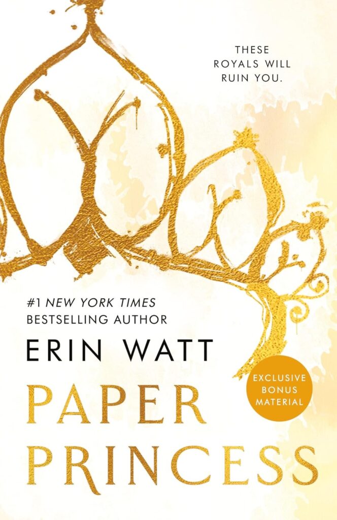 The book cover for Paper Princess by Erin Watt features a gold, watercolor‑style crown against a soft cream and gold background. The tagline “These Royals Will Ruin You” appears at the top, with a circular badge noting “Exclusive Bonus Material.” The author’s name and title are displayed in bold, elegant lettering.